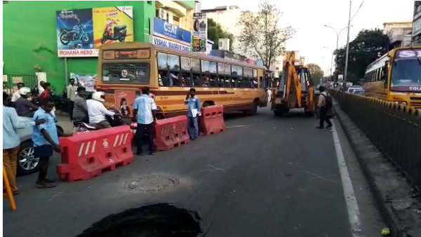 A sudden groove of about 10 feet depth is found on the road in rayapuram , chennai A sudden groove of about 10 feet depth is found on the road in rayapuram , chennai