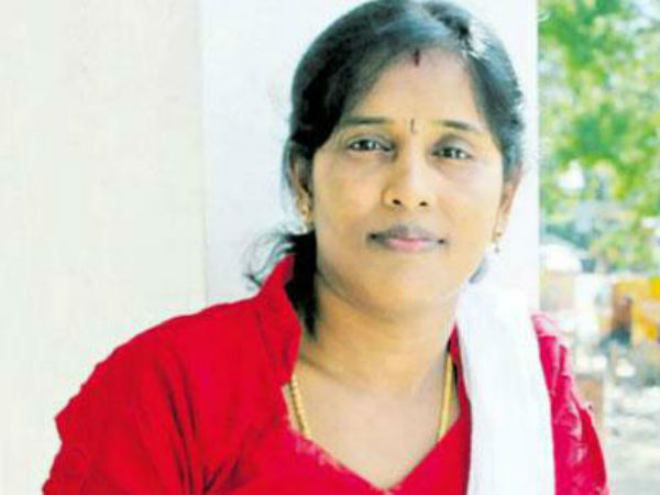 Sumathi Teacher giving Free Yoga Training to Tribals Sumathi Teacher giving Free Yoga Training to Tribals