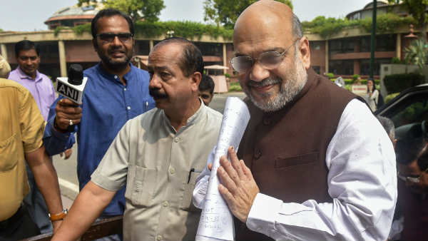Amit Shah introduces J&K resolutions in LS Amit Shah introduces J&K resolutions in LS