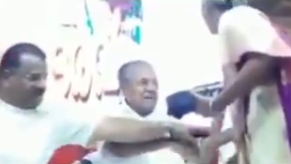 Kerala Chief Minister Pinarayi Vijayan shouts at woman during flood relief event in kannur Kerala Chief Minister Pinarayi Vijayan shouts at woman during flood relief event in kannur