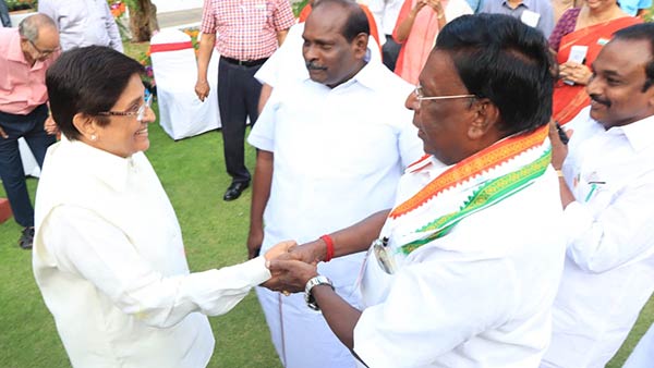 kiran bedi and narayanasamy share lighter moment during independence day tea party kiran bedi and narayanasamy share lighter moment during independence day tea party