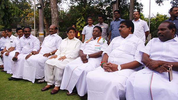 kiran bedi and narayanasamy share lighter moment during independence day tea party kiran bedi and narayanasamy share lighter moment during independence day tea party