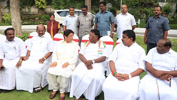 kiran bedi and narayanasamy share lighter moment during independence day tea party kiran bedi and narayanasamy share lighter moment during independence day tea party
