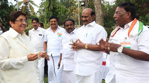kiran bedi and narayanasamy share lighter moment during independence day tea party kiran bedi and narayanasamy share lighter moment during independence day tea party