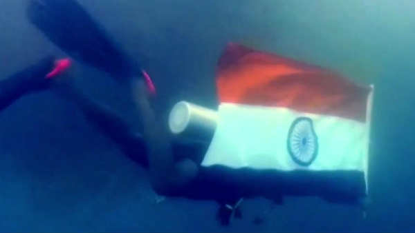 Swimming experts from Pondicherry swim with National Flag Swimming experts from Pondicherry swim with National Flag
