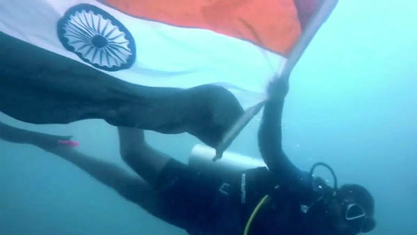 Swimming experts from Pondicherry swim with National Flag Swimming experts from Pondicherry swim with National Flag