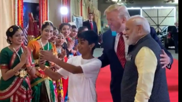 A boy stops Trump and Modi to take a Selfie A boy stops Trump and Modi to take a Selfie