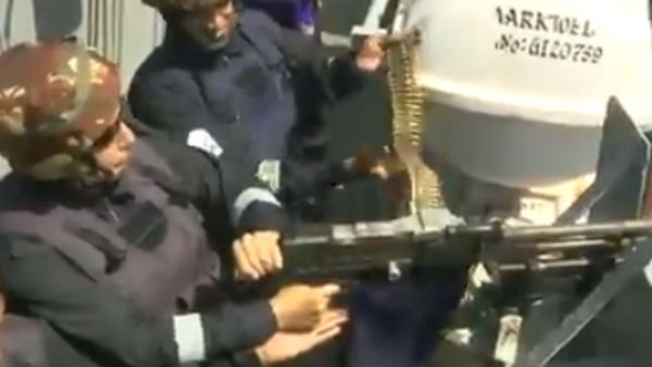 Minister Rajnath Singh fired machine gun on-board INS Vikramaditya Minister Rajnath Singh fired machine gun on-board INS Vikramaditya
