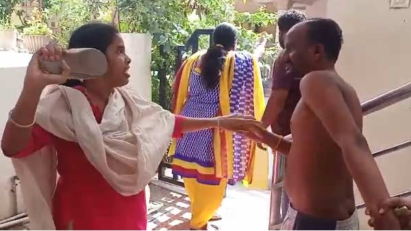 Wife attacks husband due to illegal affair Wife attacks husband due to illegal affair