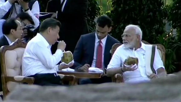 PM Modi gives tender coconur to Chinese president Xi Jinping in Mamallapuram PM Modi gives tender coconur to Chinese president Xi Jinping in Mamallapuram