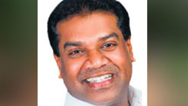 dmk tirupur district executive arrested for producing fake passports dmk tirupur district executive arrested for producing fake passports