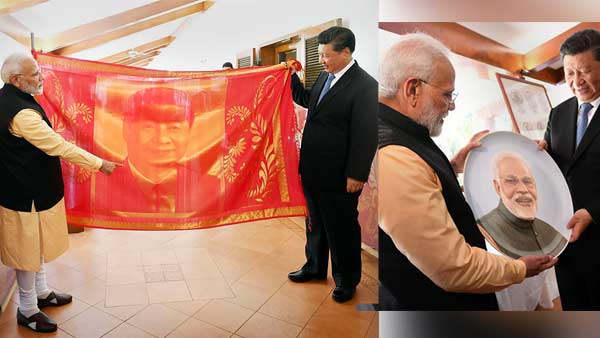 இவருக்கு அவர் பட்டு சேலை வழங்க.. அவர் தட்டு கொடுக்க.. அன்பை பரிமாறி கொண்ட மோடி, ஜின்பிங்!