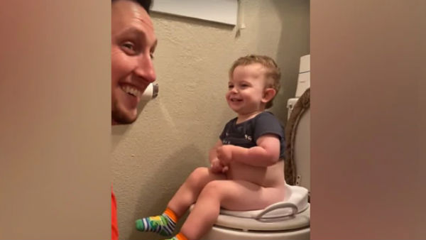 A video of dad and son goes viral A video of dad and son goes viral