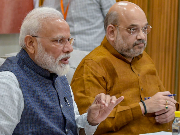 PM Narendra Modi meets Union Cabinet before he leaves to Brazil PM Narendra Modi meets Union Cabinet before he leaves to Brazil