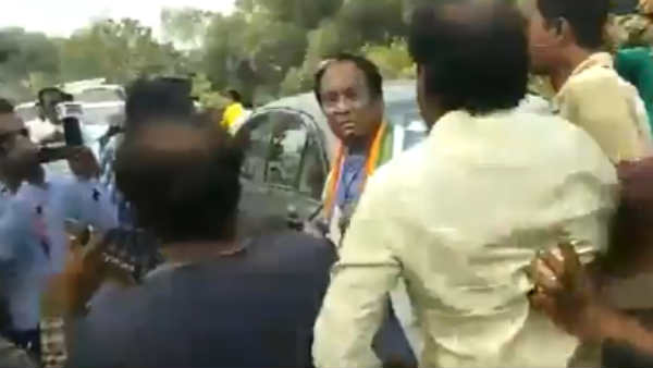 West Bengal BJP candidate for Karimpur bypoll, Joy Prakash Majumdar kicked allegedly by TMC workers West Bengal BJP candidate for Karimpur bypoll, Joy Prakash Majumdar kicked allegedly by TMC workers