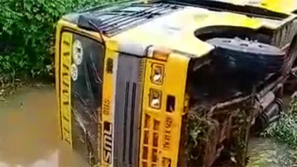 school bus falls in roadside canal near trichy school bus falls in roadside canal near trichy