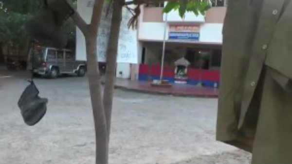 The police hanged their uniforms at the police station entrance in Puducherry The police hanged their uniforms at the police station entrance in Puducherry