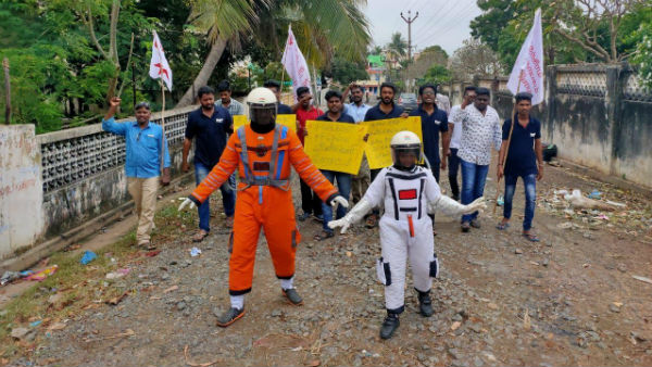 The youths staged a protest demanding the repair of the road The youths staged a protest demanding the repair of the road