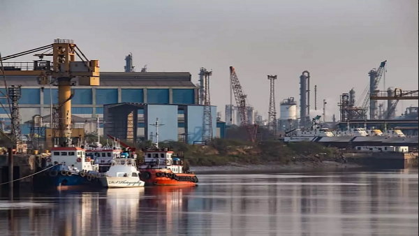 Indian Navy is inspecting equipment on a Karachi bound vessel at port in Gujarat Indian Navy is inspecting equipment on a Karachi bound vessel at port in Gujarat