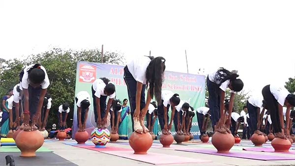 In Puducherry Beach Road School students perform various yoga poses In Puducherry Beach Road School students perform various yoga poses