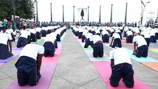 In Puducherry Beach Road School students perform various yoga poses In Puducherry Beach Road School students perform various yoga poses