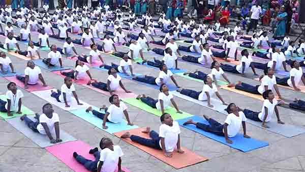 In Puducherry Beach Road School students perform various yoga poses In Puducherry Beach Road School students perform various yoga poses
