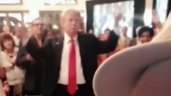 trump waving his hand during national anthem trump waving his hand during national anthem