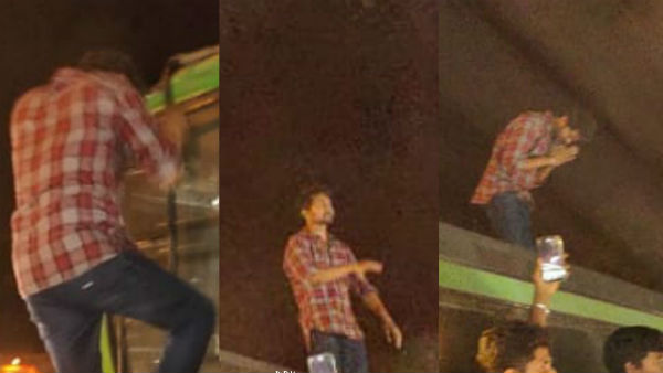 Vijay waves hand to fans in Neyveli Vijay waves hand to fans in Neyveli