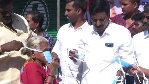 Admk party members face mask distribution to the public Admk party members face mask distribution to the public