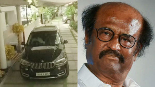 Press meet: Rajinikanth fans throw flowers on his car Press meet: Rajinikanth fans throw flowers on his car