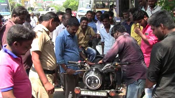 A snake in a young mans two-wheeler A snake in a young mans two-wheeler