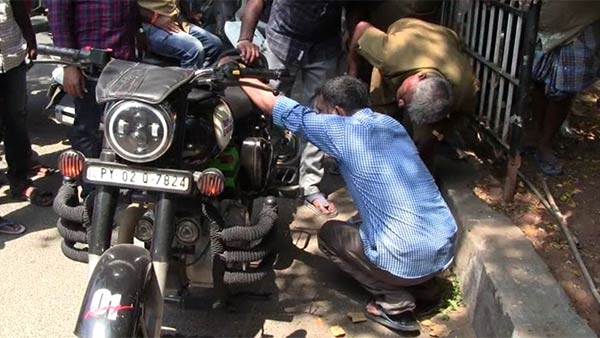 A snake in a young mans two-wheeler A snake in a young mans two-wheeler