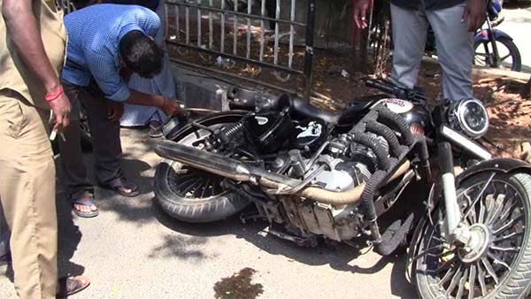 A snake in a young mans two-wheeler A snake in a young mans two-wheeler