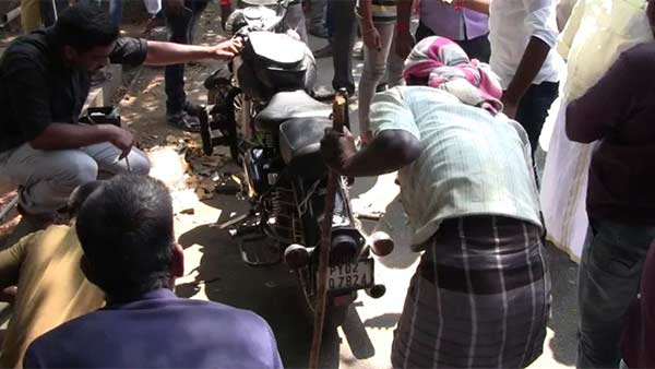 A snake in a young mans two-wheeler A snake in a young mans two-wheeler