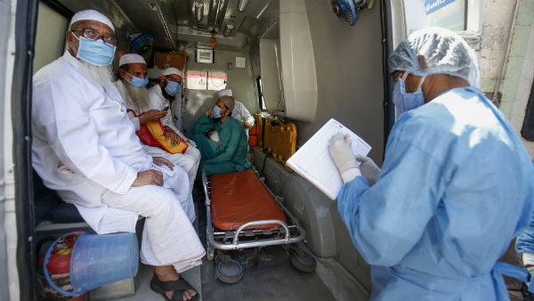 Coronavirus: Eight Persons caught at Delhi airport trying to flee to Malaysia Coronavirus: Eight Persons caught at Delhi airport trying to flee to Malaysia