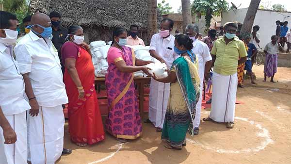 Minister Valarmathi distributes 5 kg of rice for poor Minister Valarmathi distributes 5 kg of rice for poor