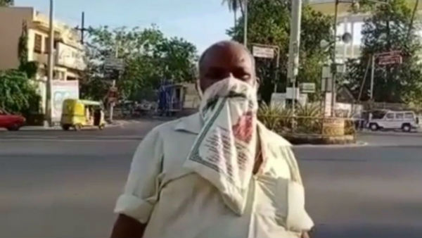 A Man uses Wedding thamboolam bag as face mask in Puducherry A Man uses Wedding thamboolam bag as face mask in Puducherry