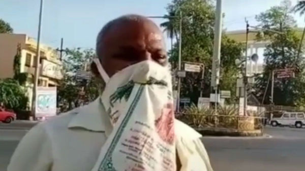 A Man uses Wedding thamboolam bag as face mask in Puducherry A Man uses Wedding thamboolam bag as face mask in Puducherry