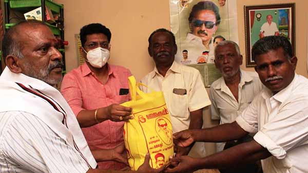 DMK MLA Saravanan helps DMK volunteer family who runs barber shop DMK MLA Saravanan helps DMK volunteer family who runs barber shop