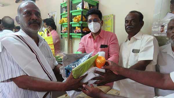DMK MLA Saravanan helps DMK volunteer family who runs barber shop DMK MLA Saravanan helps DMK volunteer family who runs barber shop