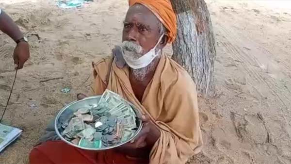 AlmsSeeker donated the Rs.50,000 money received to the Madurai District Collector AlmsSeeker donated the Rs.50,000 money received to the Madurai District Collector