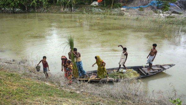 Assam flood : heavy rain affects normal life Assam flood : heavy rain affects normal life