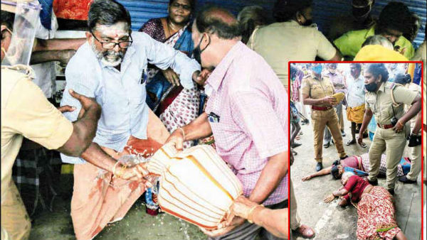 woman in Trichy tries to self immolates in Gandhi market woman in Trichy tries to self immolates in Gandhi market