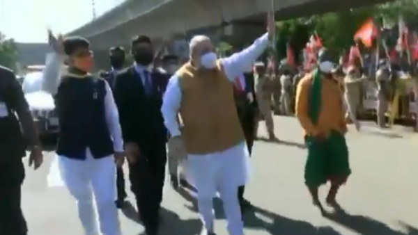 Man arrested for throwing banner at Amit Shah Man arrested for throwing banner at Amit Shah