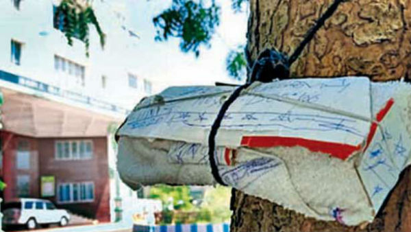 An unonymous parcel was hanged out in Theni Collector Office An unonymous parcel was hanged out in Theni Collector Office