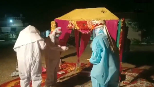Viral video of Rajasthan couple getting married in PPE kits at Covid Centre Viral video of Rajasthan couple getting married in PPE kits at Covid Centre