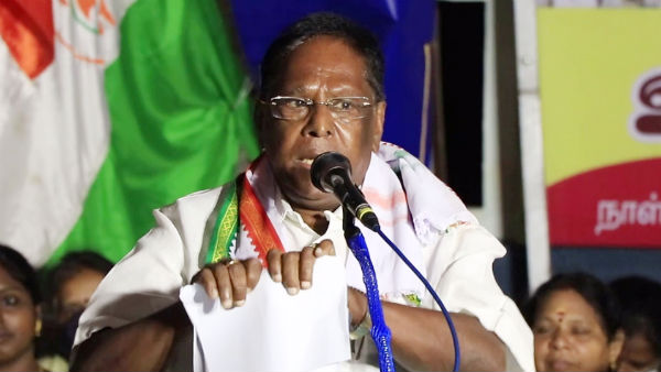 Puducherry CM Narayanasamy also tears Farm Law copies Puducherry CM Narayanasamy also tears Farm Law copies