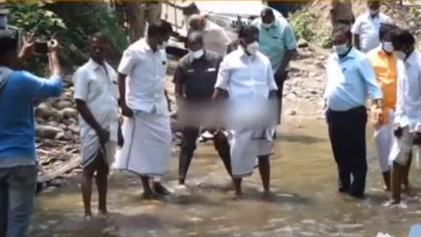 கையில் செருப்பு