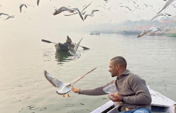 Dhawan feeds birds amid bird flu in Varanasi Dhawan feeds birds amid bird flu in Varanasi