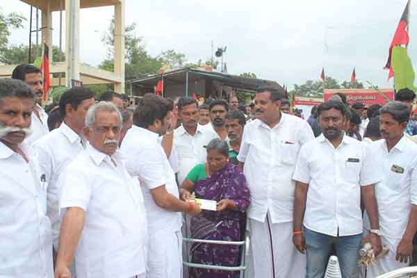 Dmk District secretary financial assistance to a woman suffering from cancer Dmk District secretary financial assistance to a woman suffering from cancer